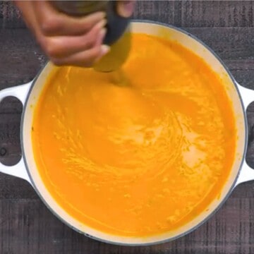 Emulsifier blender blending butternut squash soup.