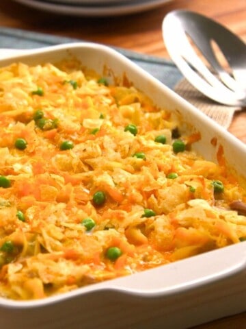 Tuna casserole in dish with serving spoon.